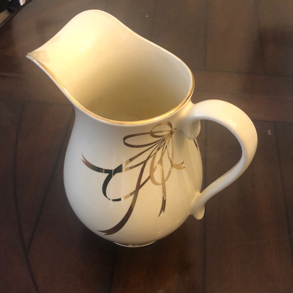 Elegant Cream Pitcher with Gold Accents